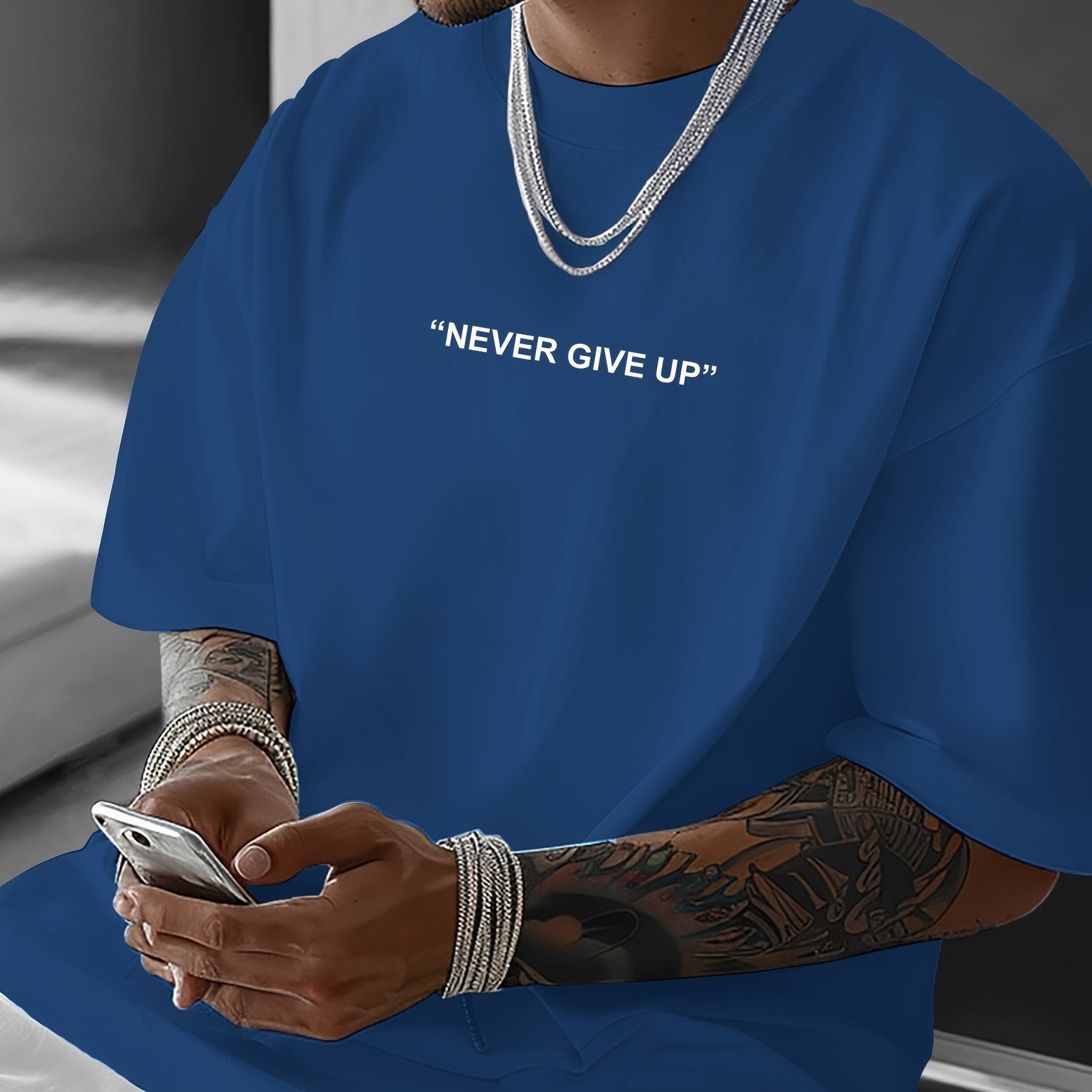 "Never Give Up Herren T-Shirt schwarz mit weißem Motivational Print oversized"